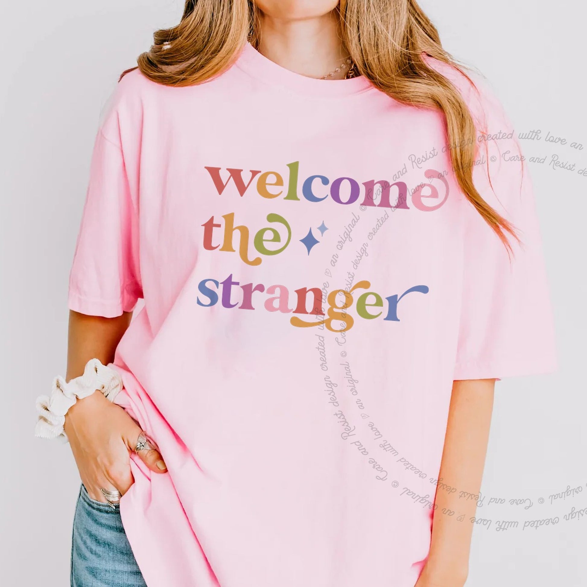 Welcome the Stranger Care & Resist rainbow Comfort Colors tee, Blossom