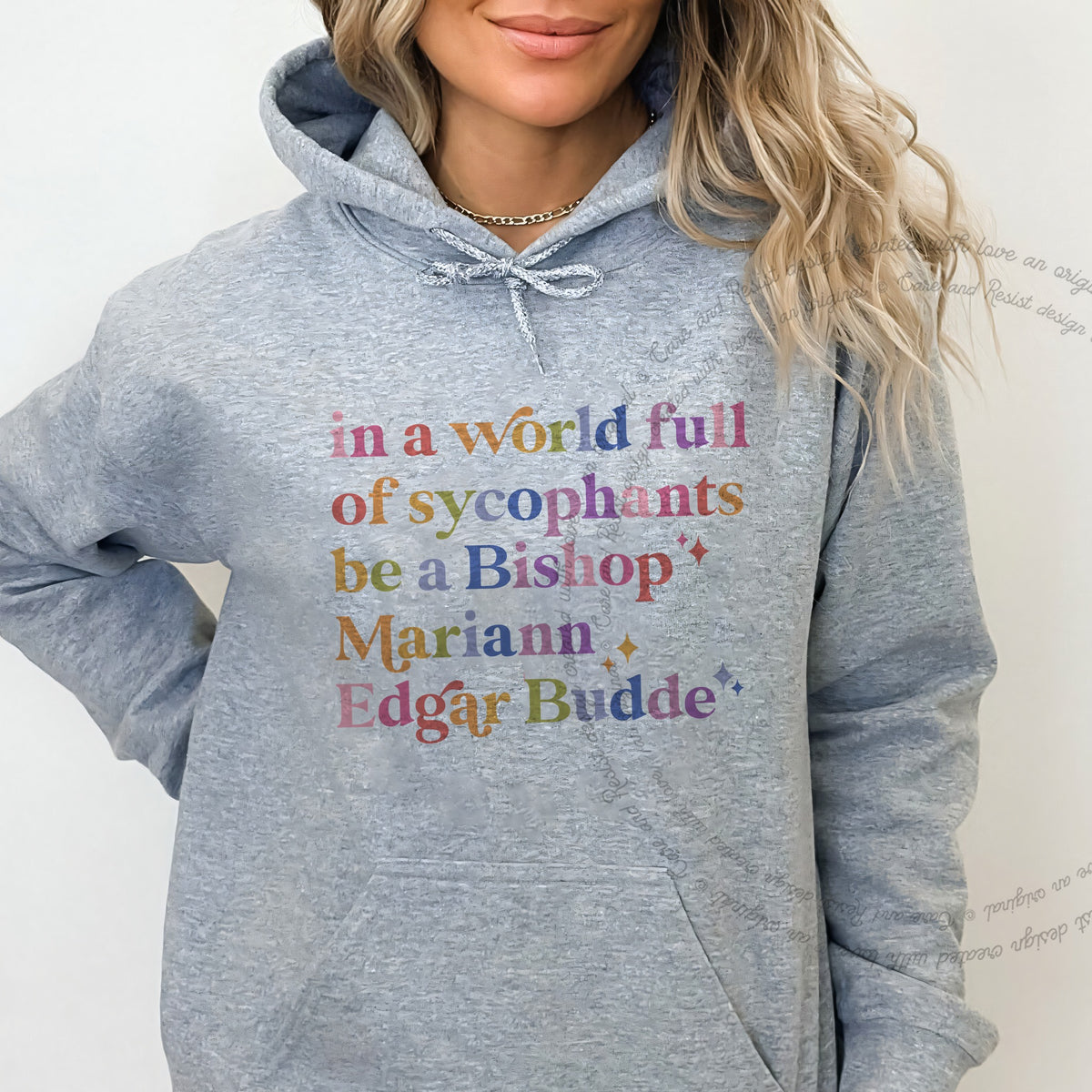 In a World Full of Sycophants Be a Bishop Mariann Edgar Budde Care & Resist Gildan hoodie in Sport Grey