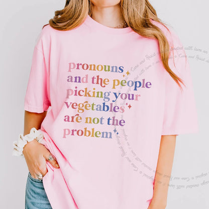 Pronouns and the People Picking Your Vegetables Are Not the Problem Care & Resist progressive t-shirt in Blossom
