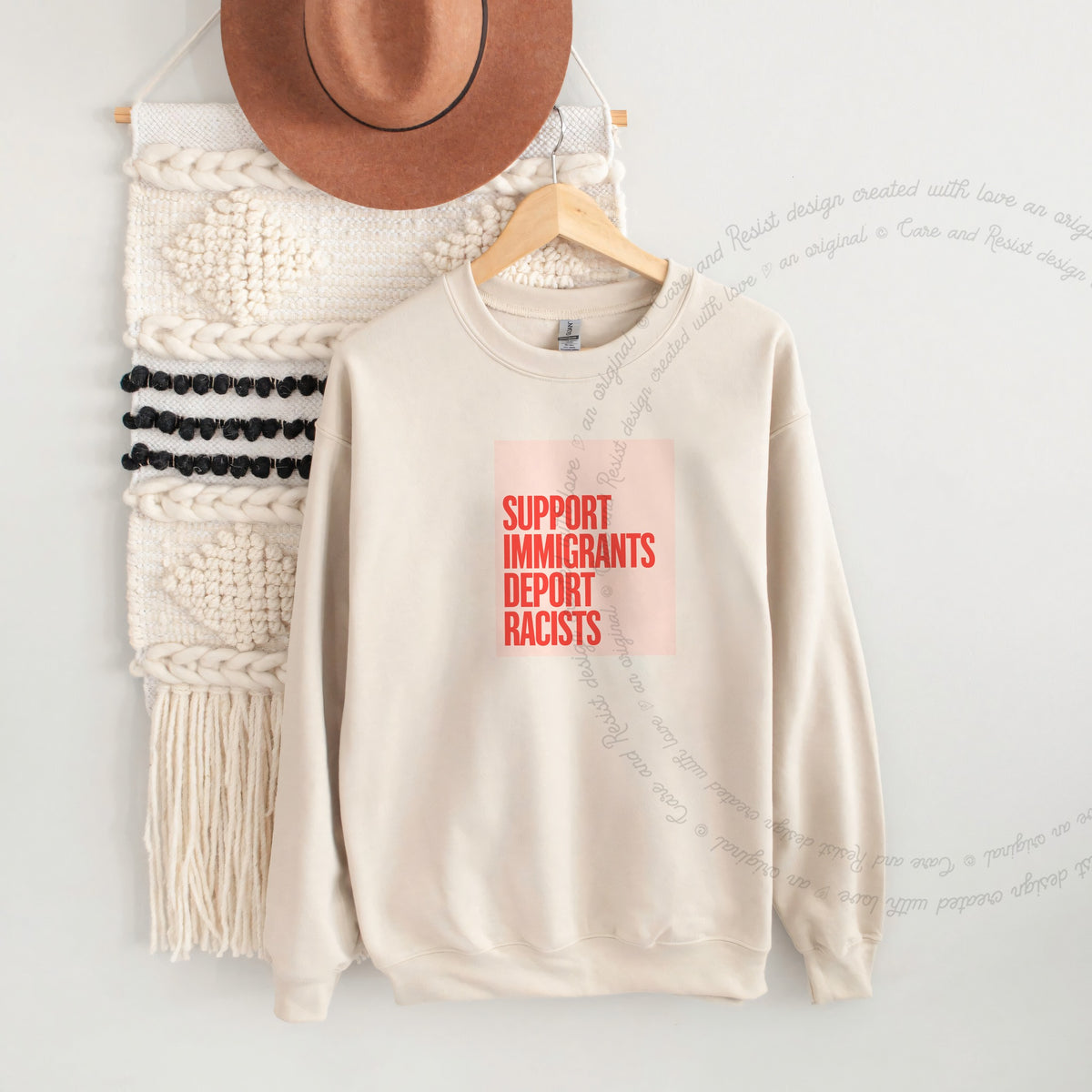 Support Immigrants Deport Racists Care & Resist Gildan crewneck sweatshirt in Sand