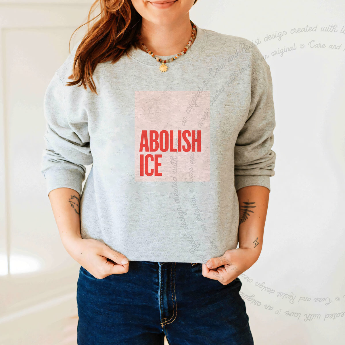Abolish ICE Care & Resist Gildan crewneck sweatshirt in Sport Grey