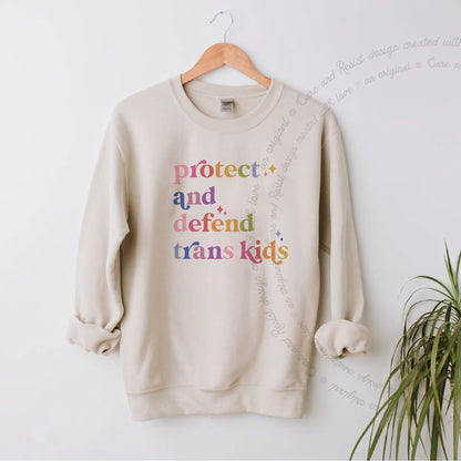Protect and Defend Trans Kids Care & Resist Gildan crewneck sweatshirt in Sand