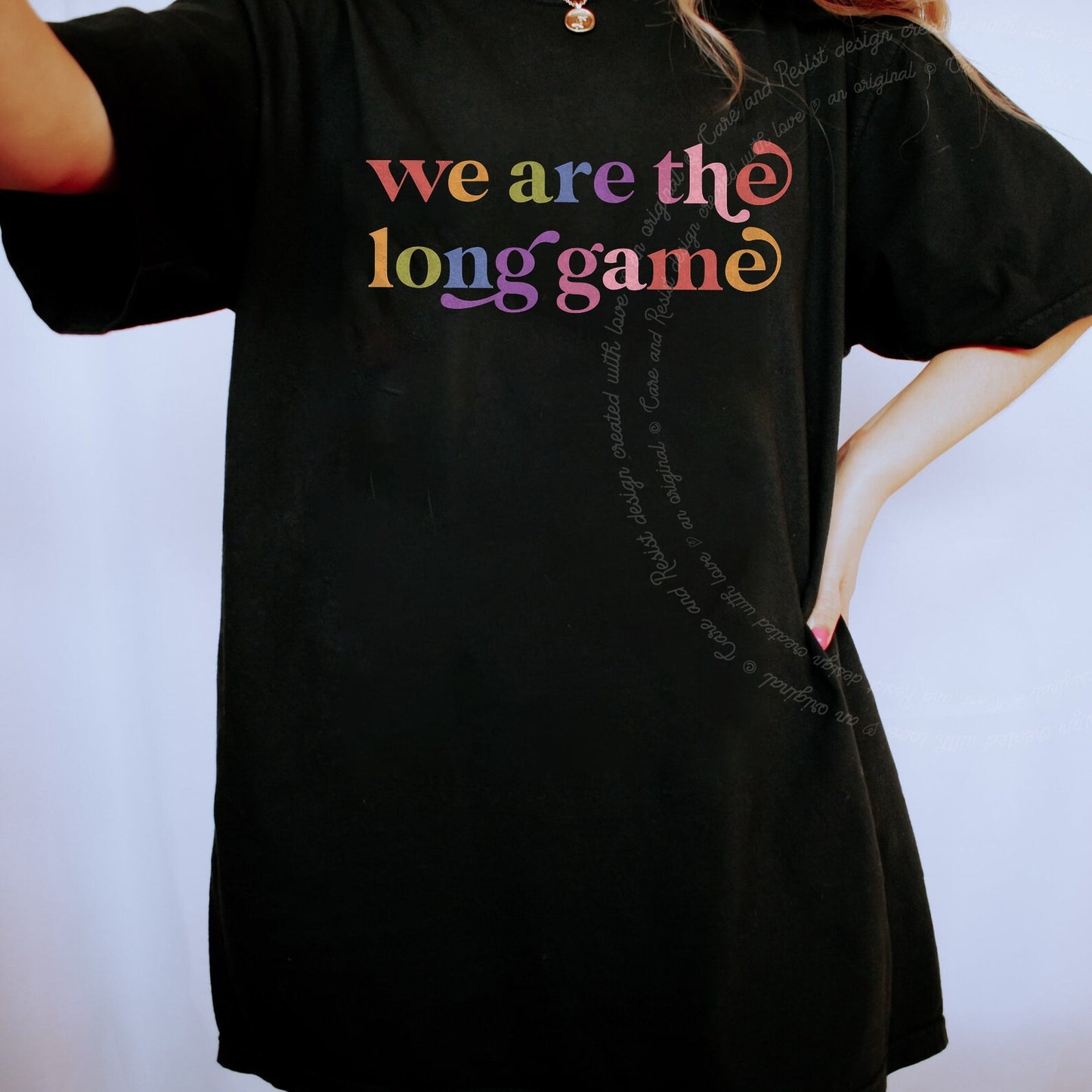 We are the Long Game Care & Resist rainbow tee