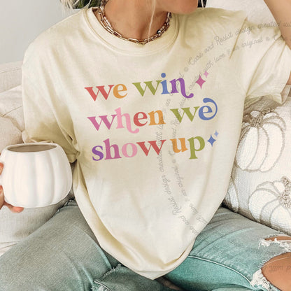 We Win When We Show Up Care & Resist rainbow Comfort Colors tee, Ivory