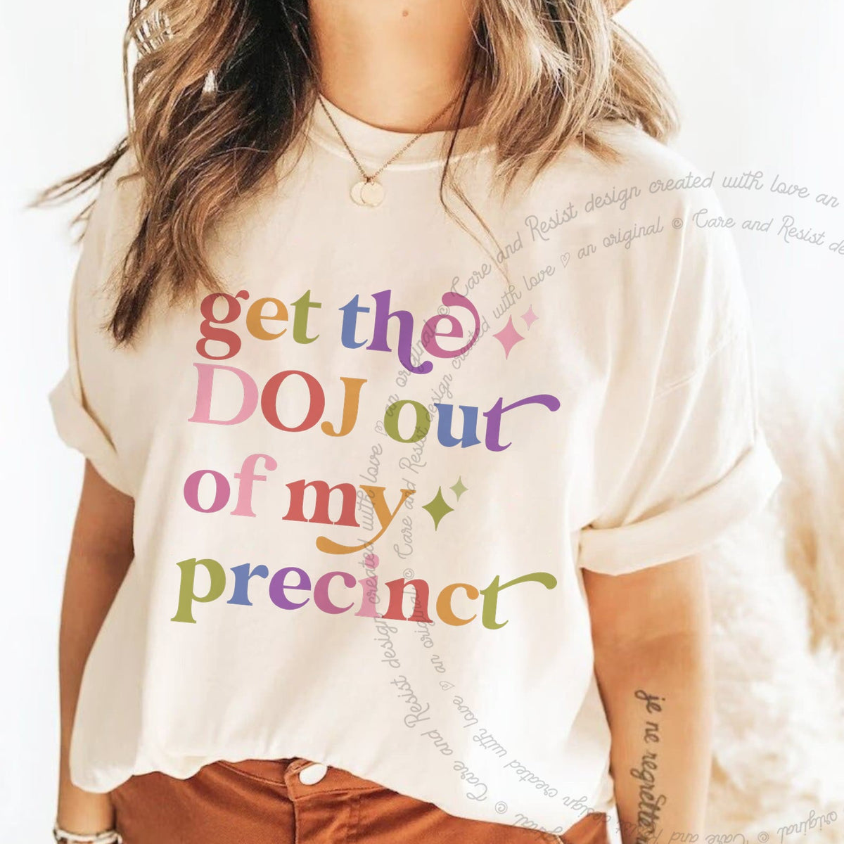 Get the DOJ Out of My Precinct Care & Resist progressive t-shirt in Ivory
