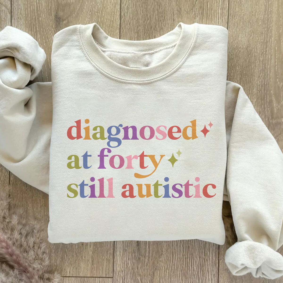 Diagnosed At Forty Still Autistic Care & Resist Gildan crewneck sweatshirt in Sand