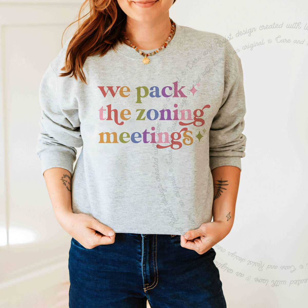 We Pack the Zoning Meetings Care & Resist Gildan crewneck sweatshirt in Sport Grey