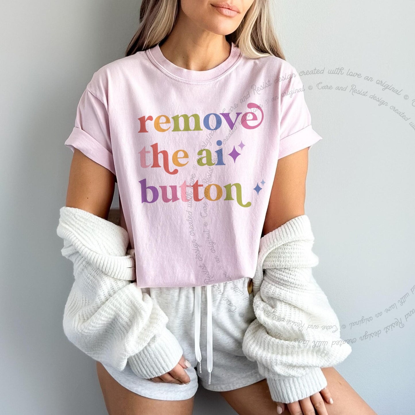 Remove the Ai Button Care & Resist rainbow tee
