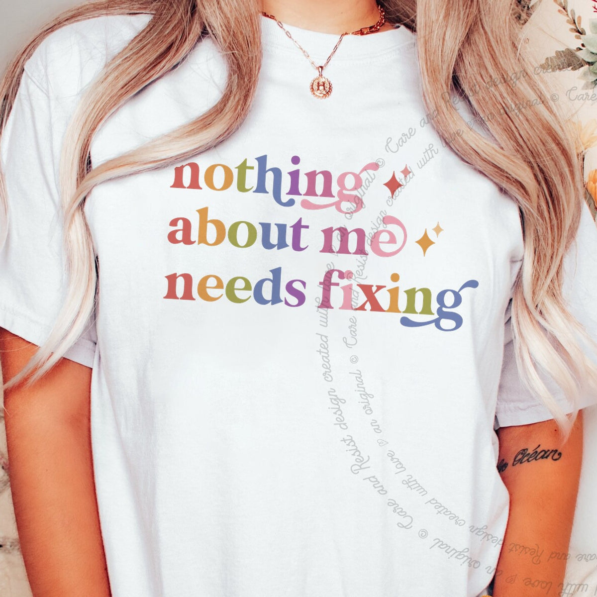 Nothing About Me Needs Fixing Care & Resist progressive t-shirt in White