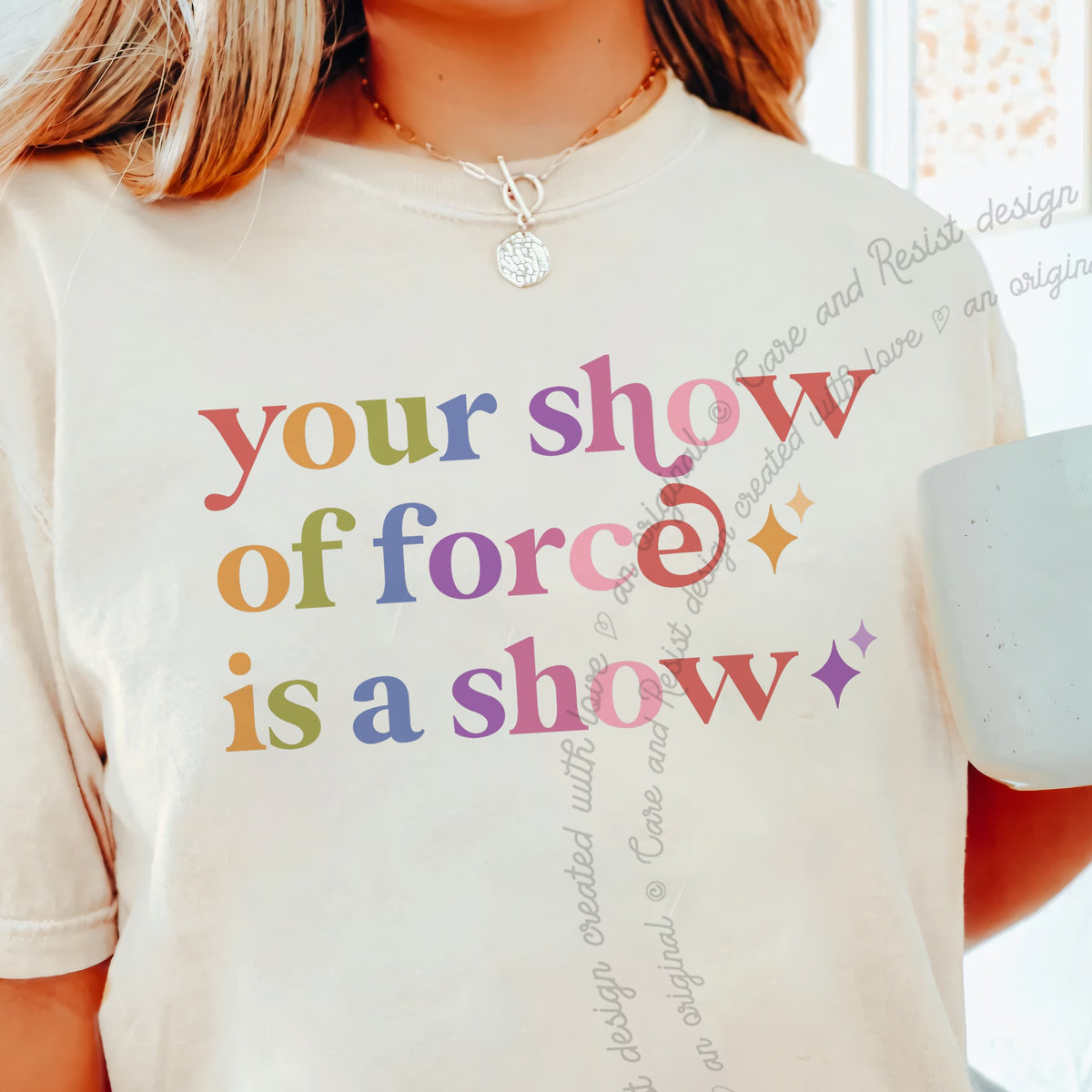 Your Show of Force is a Show Care & Resist progressive t-shirt in Ivory