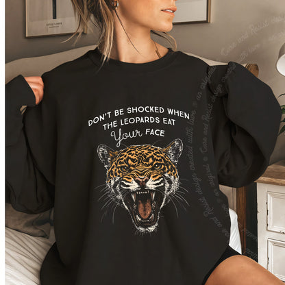 Don't Be Shocked When the Leopards Eat Your Face Care & Resist Gildan crewneck sweatshirt in Black