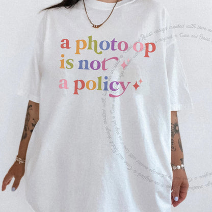 A Photo Op is not a Policy Care & Resist rainbow tee