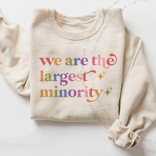 We are the Largest Minority Care & Resist Gildan crewneck sweatshirt in Sand
