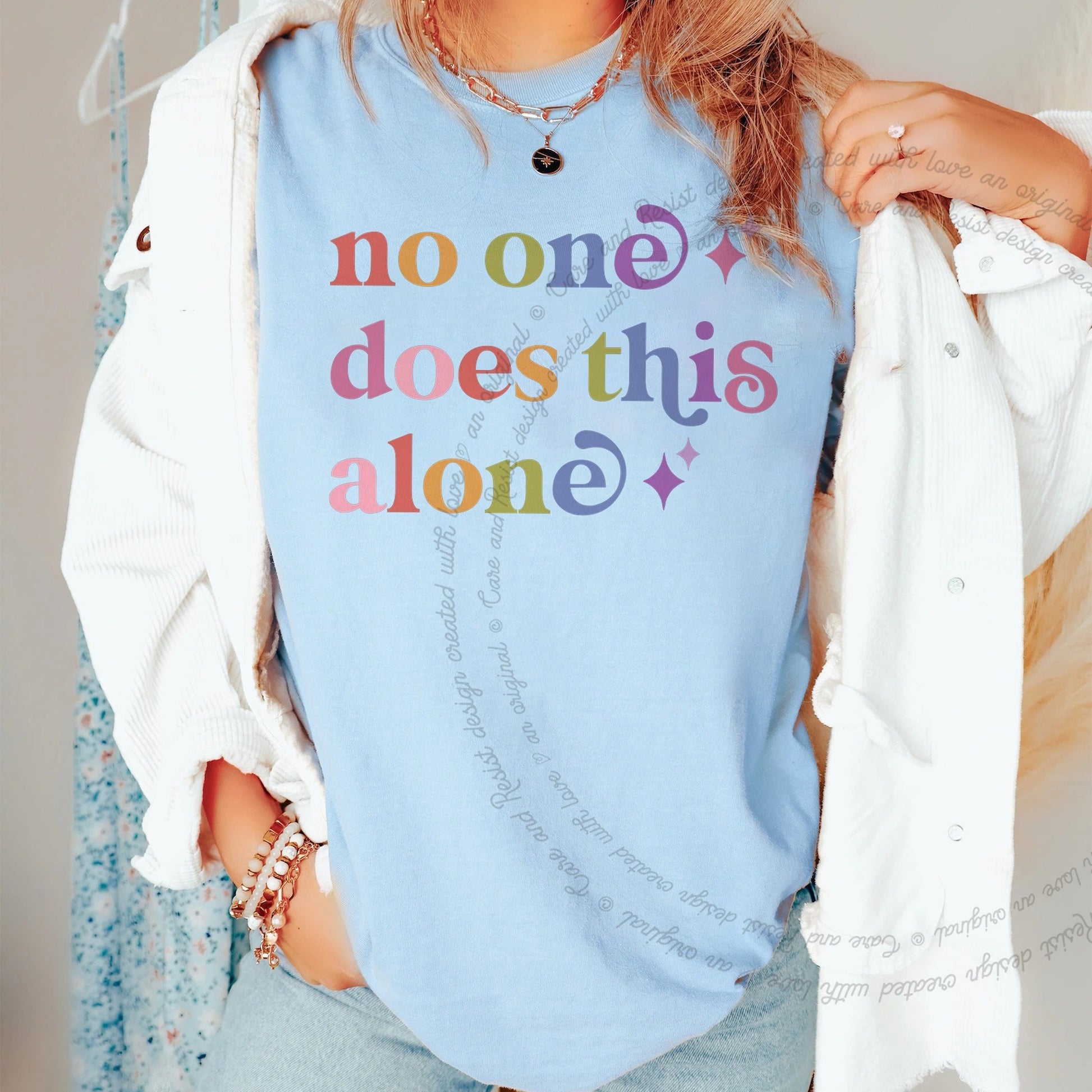 No One Does This Alone Care & Resist rainbow tee