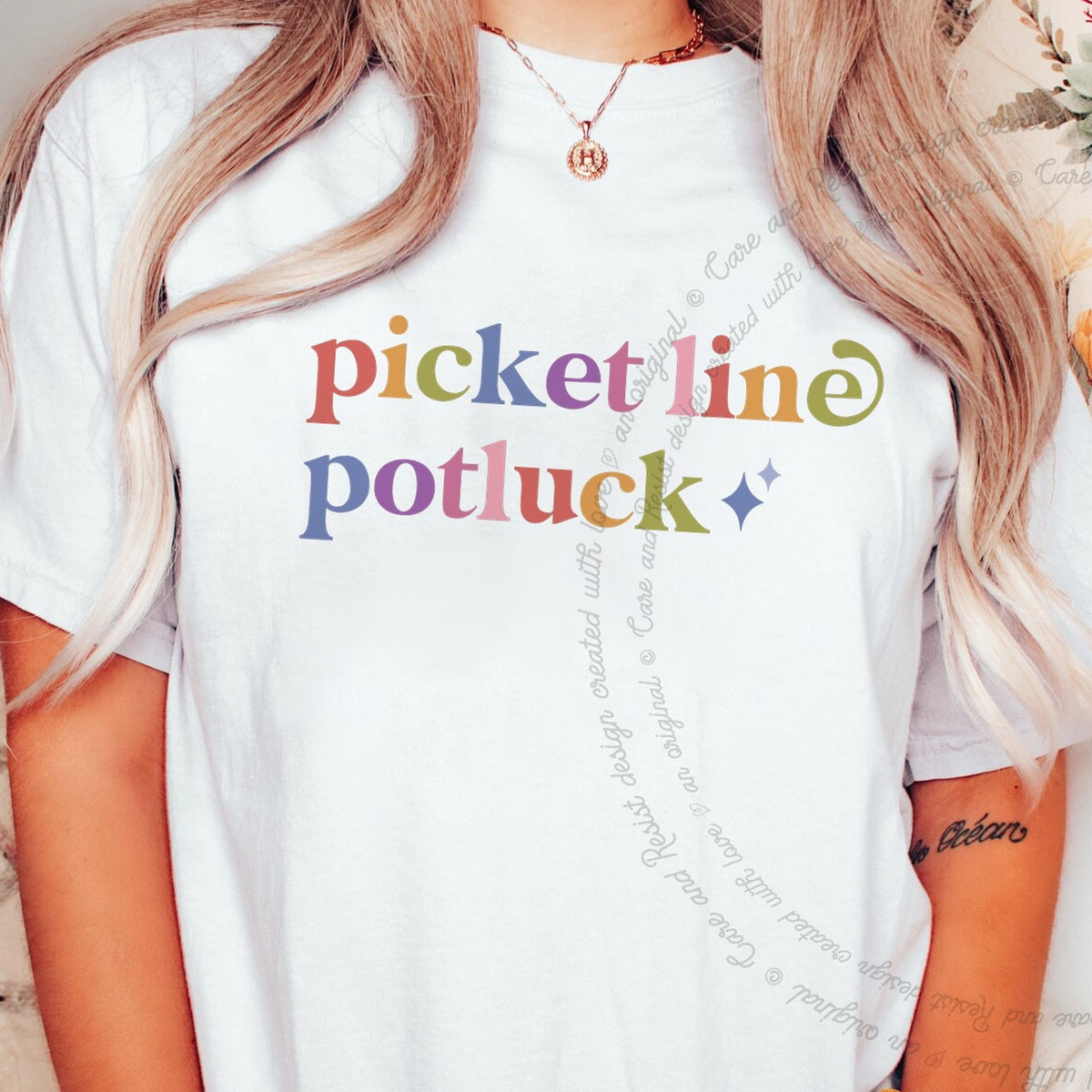 Picket Line Potluck Care & Resist progressive t-shirt in White