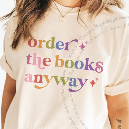 Order the Books Anyway Care & Resist progressive t-shirt in Ivory