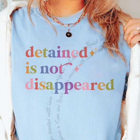 Detained is not Disappeared Care & Resist progressive t-shirt in Chambray