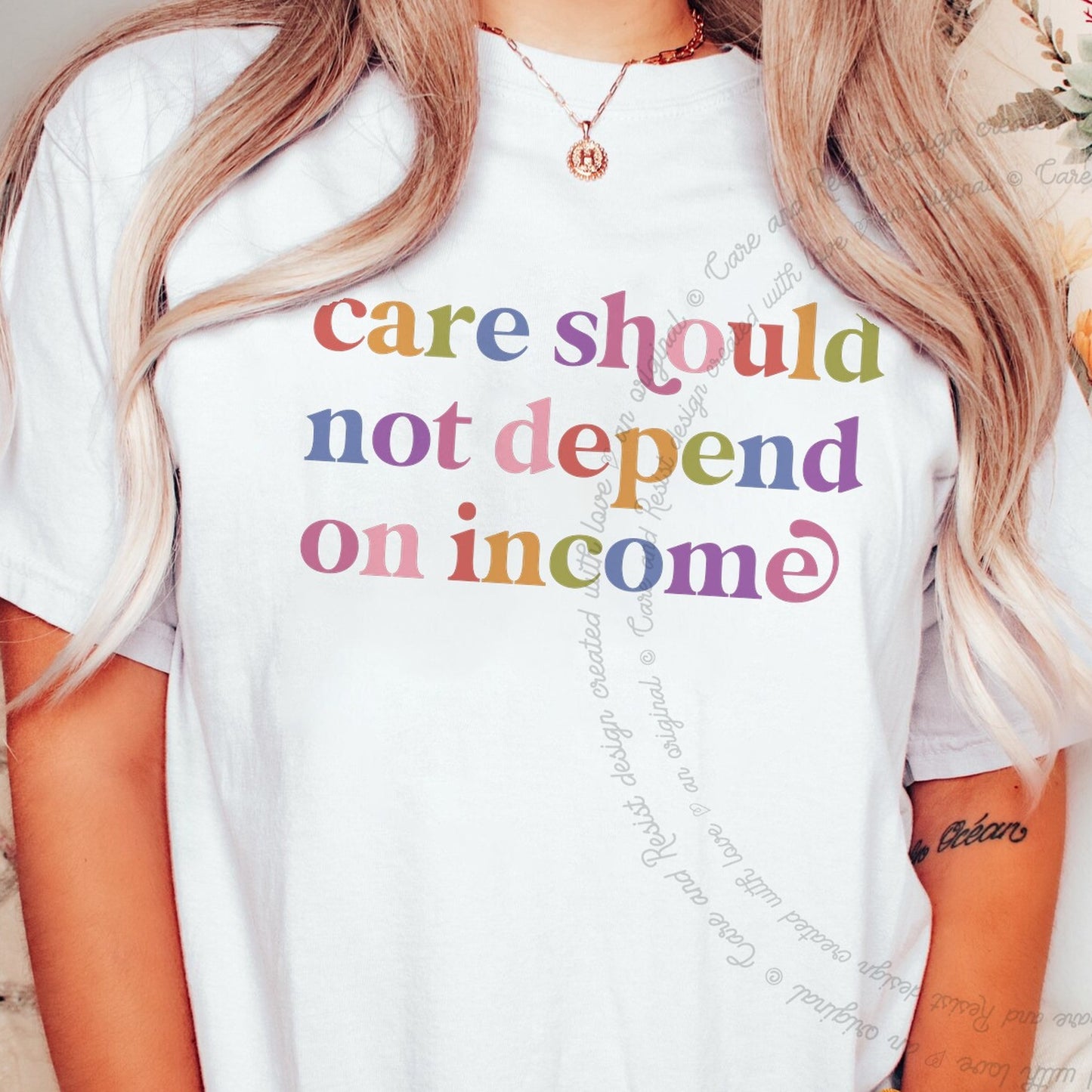 Care Should not Depend on Income Care & Resist rainbow Comfort Colors tee, White