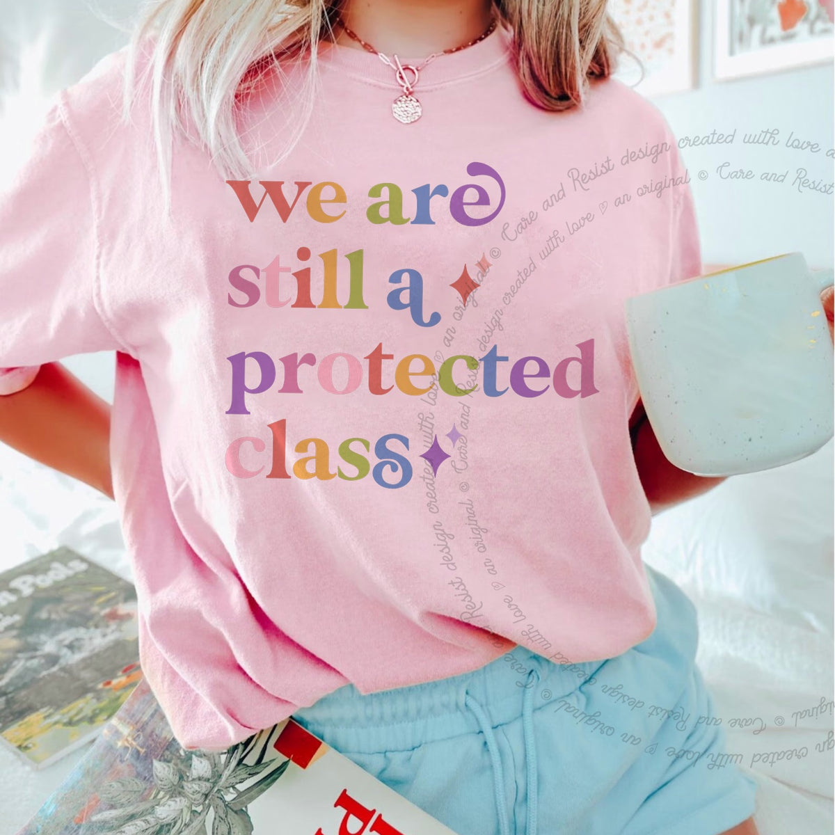 We are Still a Protected Class Care & Resist tee in Blossom