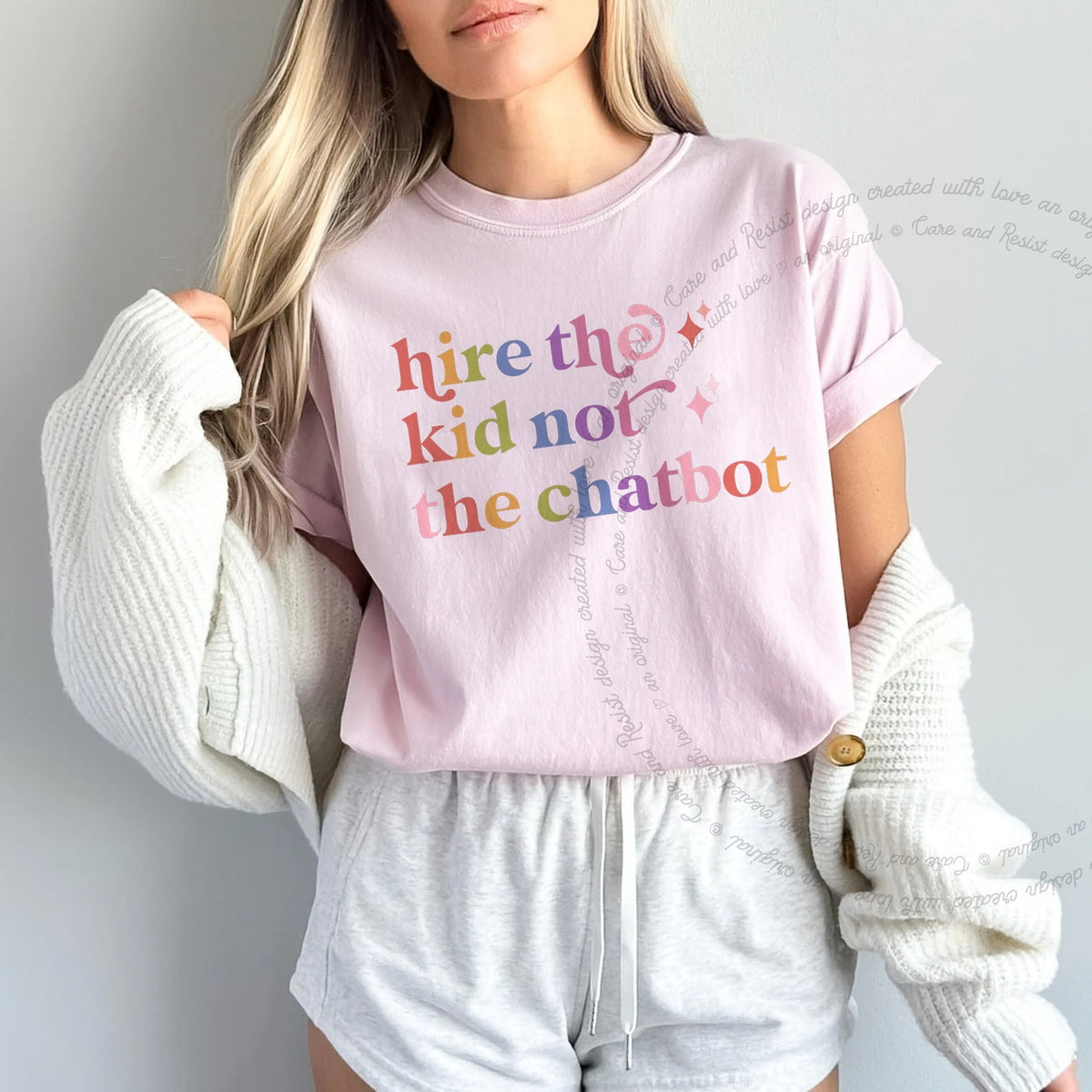 Hire the Kid not the Chatbot Care & Resist rainbow tee
