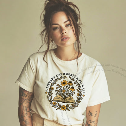 A Library Card Beats a Paywall Badge Care & Resist progressive t-shirt in Ivory