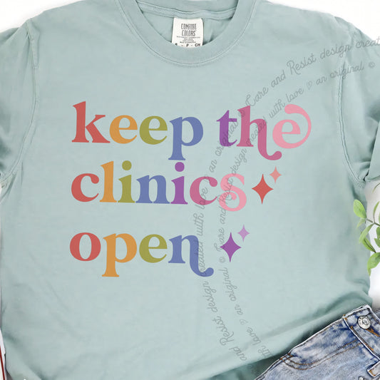 Keep the Clinics Open Care & Resist progressive t-shirt in Bay