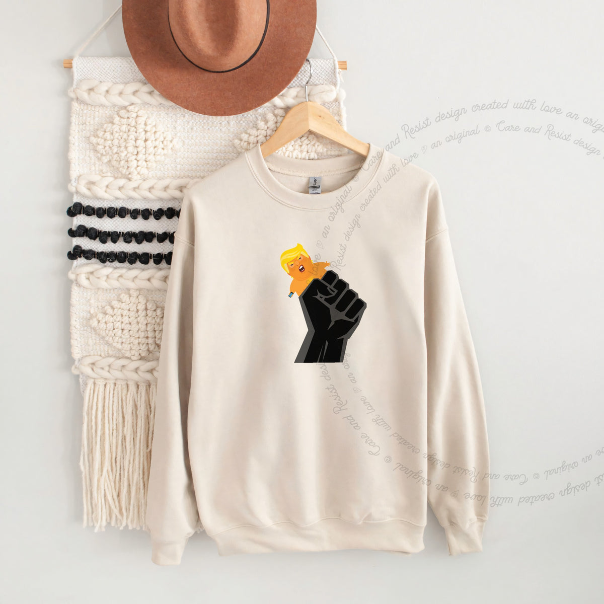 Resist Fist and Trump Blimp Care & Resist Gildan crewneck sweatshirt in Sand