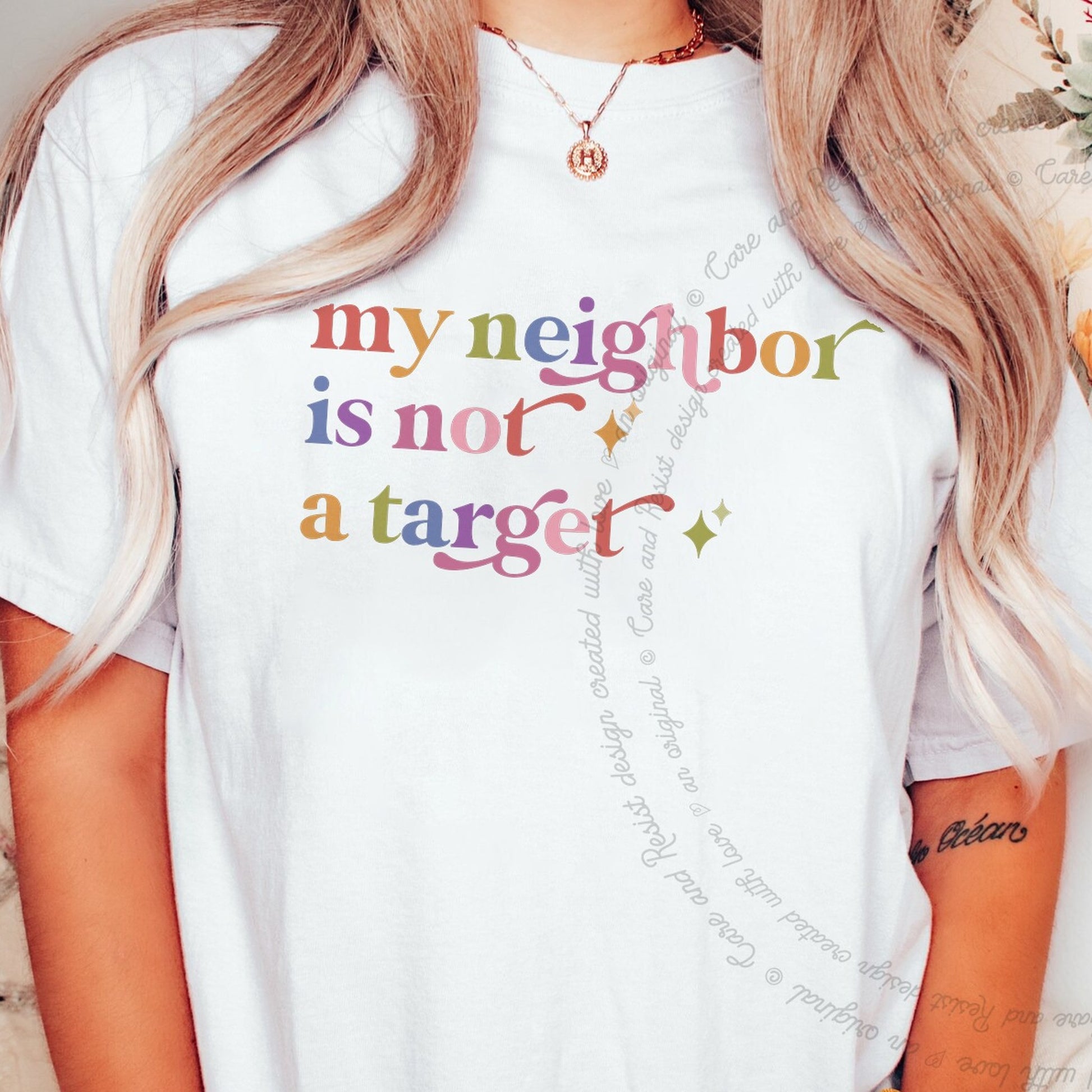 My Neighbor is not a Target Care & Resist rainbow tee