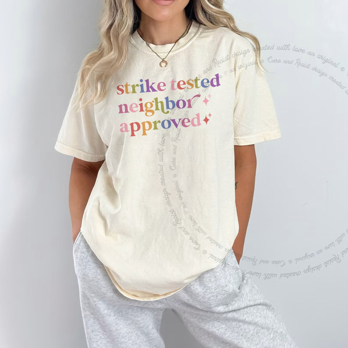 Strike Tested Neighbor Approved Care & Resist tee in Ivory