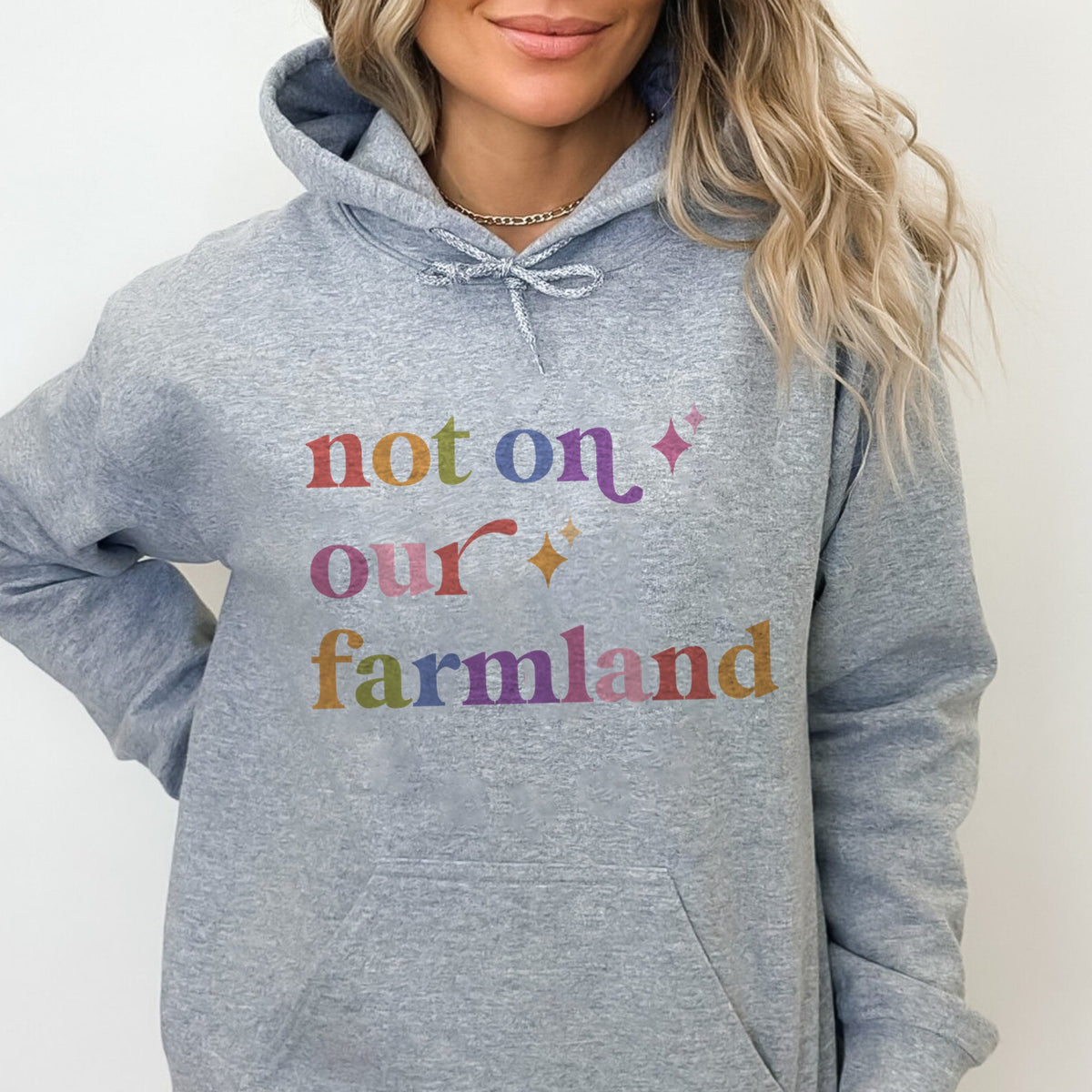Not on Our Farmland Care & Resist Gildan hoodie in Sport Grey