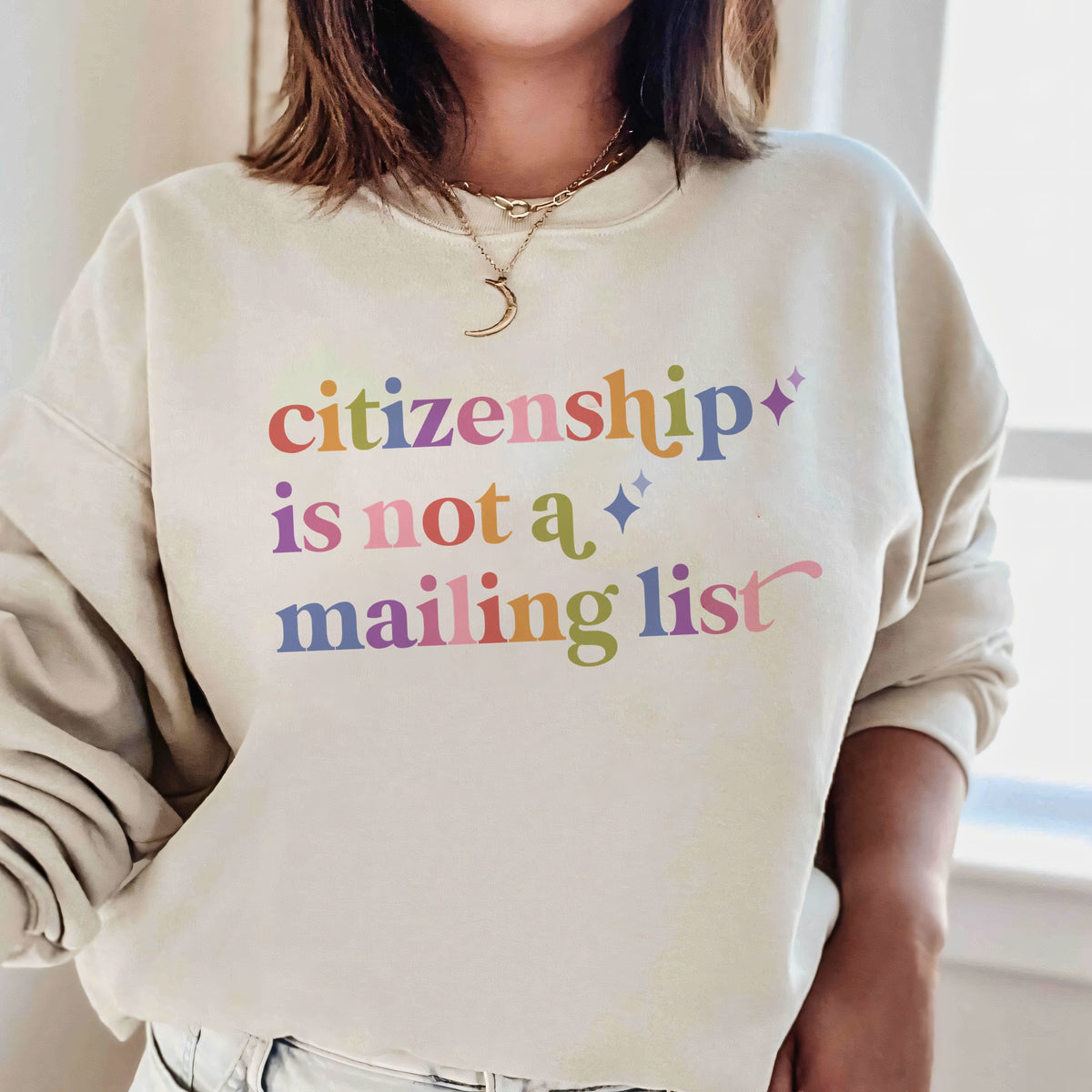 Citizenship is not a Mailing List Care & Resist Gildan crewneck sweatshirt in Sand