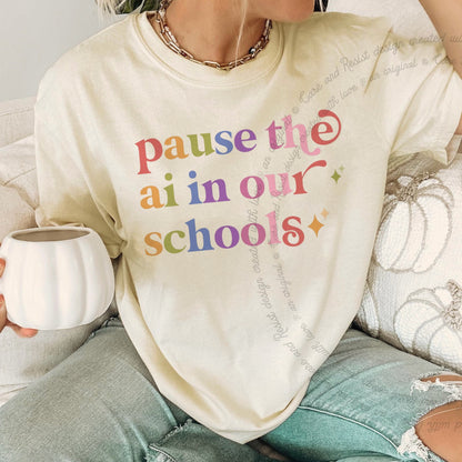 Pause the Ai in Our Schools Care & Resist rainbow tee