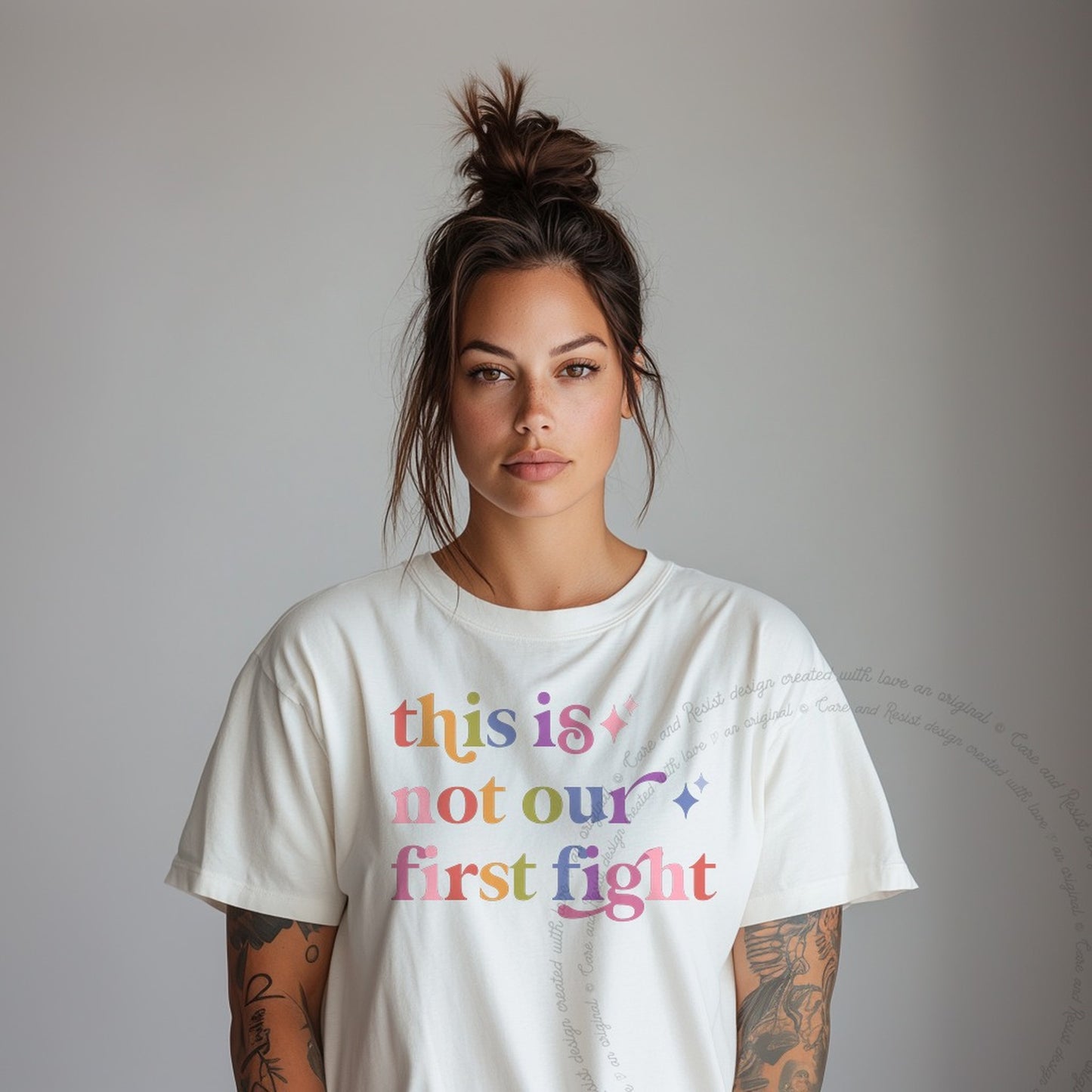 This is not Our First Fight Care & Resist rainbow tee