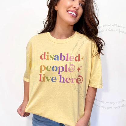 Disabled People Live Here Care & Resist rainbow tee