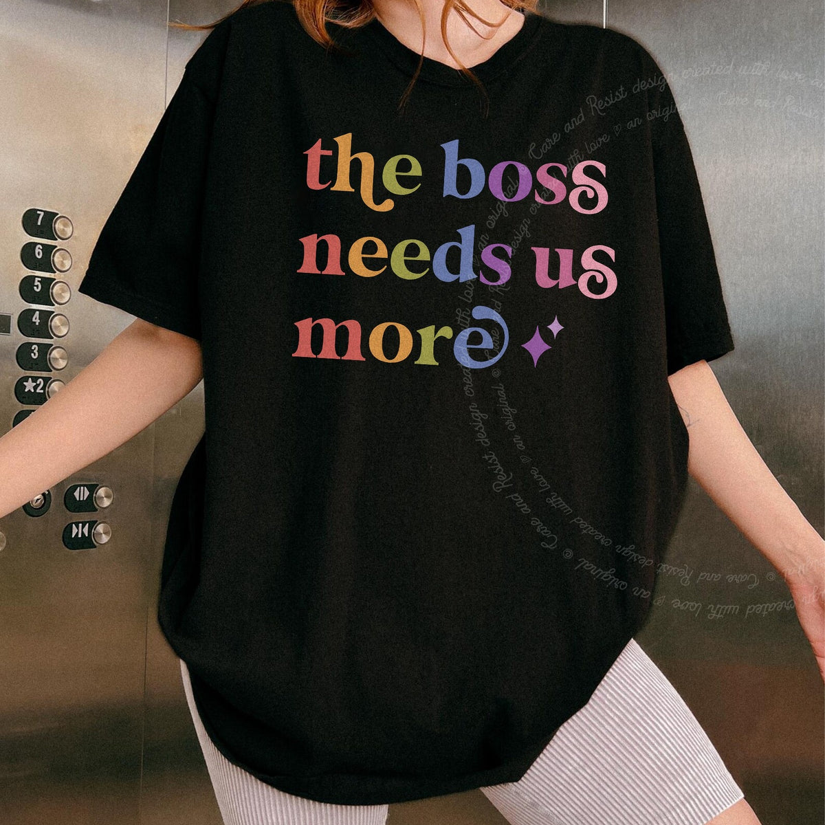 The Boss Needs Us More Care & Resist rainbow tee