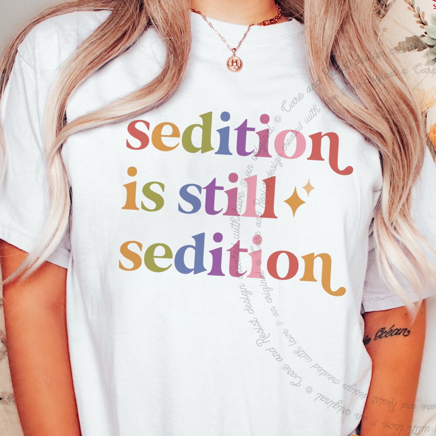 Sedition is Still Sedition Care & Resist rainbow tee