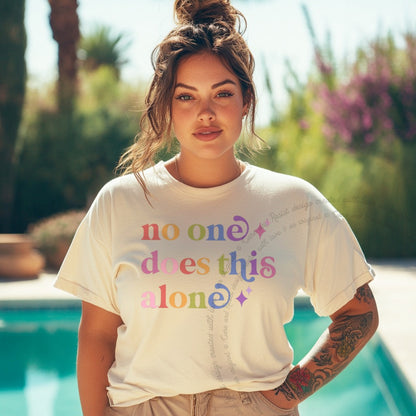 No One Does This Alone Care & Resist rainbow tee