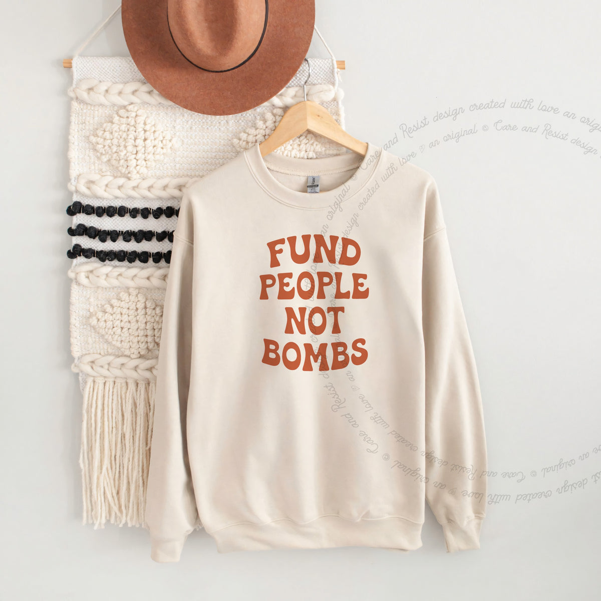 Fund People not Bombs Stacked Care & Resist Gildan crewneck sweatshirt in Sand