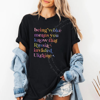 Being Woke Means You Know That Russia Invaded Ukraine Care & Resist progressive t-shirt in Black