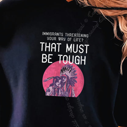 Immigrants Threatening Your Way of Life? That Must Be Tough Care & Resist Gildan hoodie in Black