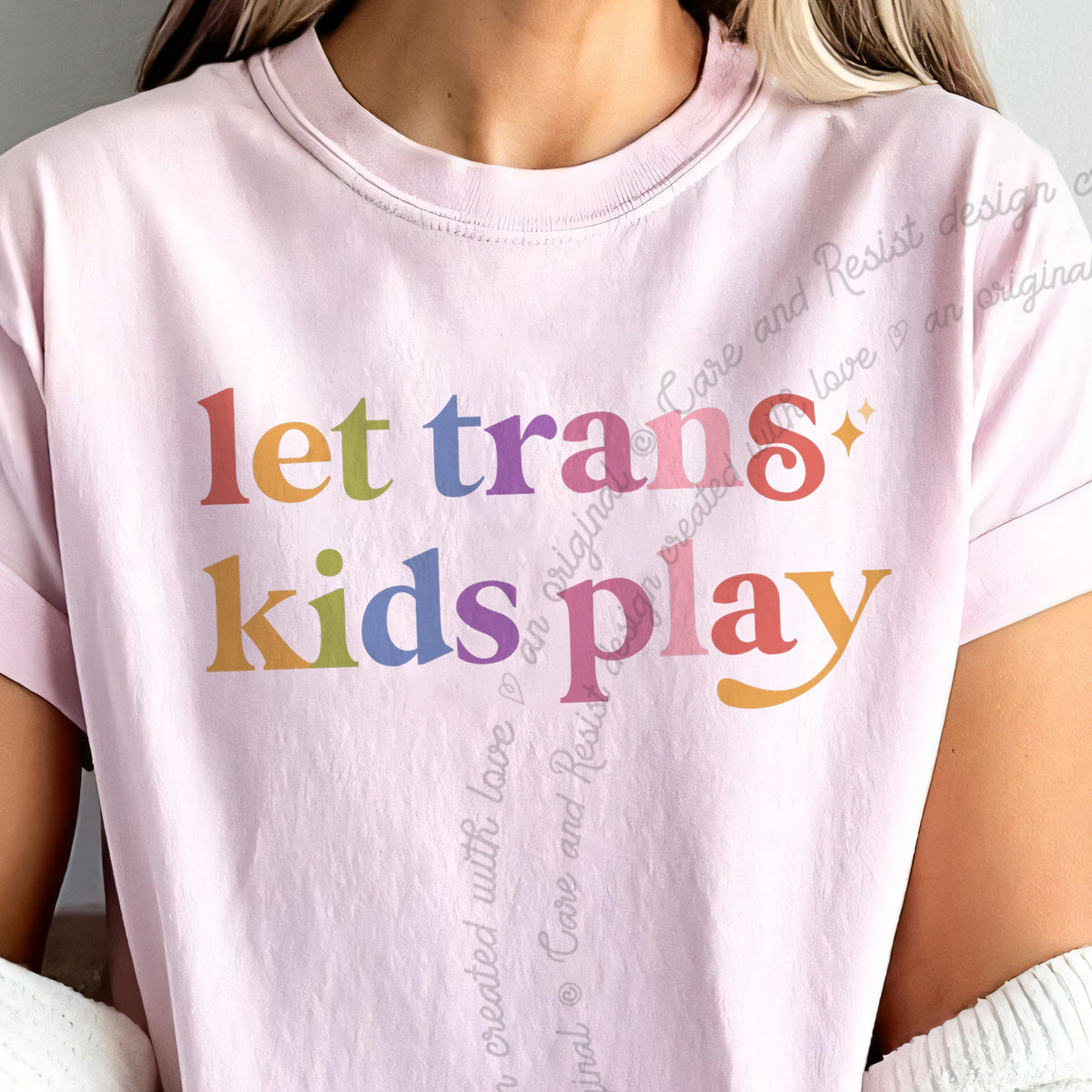 Let Trans Kids Play Care & Resist progressive t-shirt in Blossom