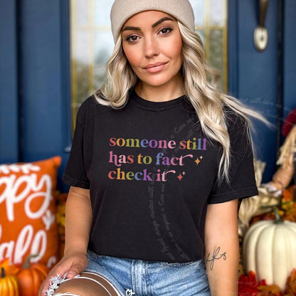Someone Still Has to Fact Check It Care & Resist rainbow Comfort Colors tee, Black