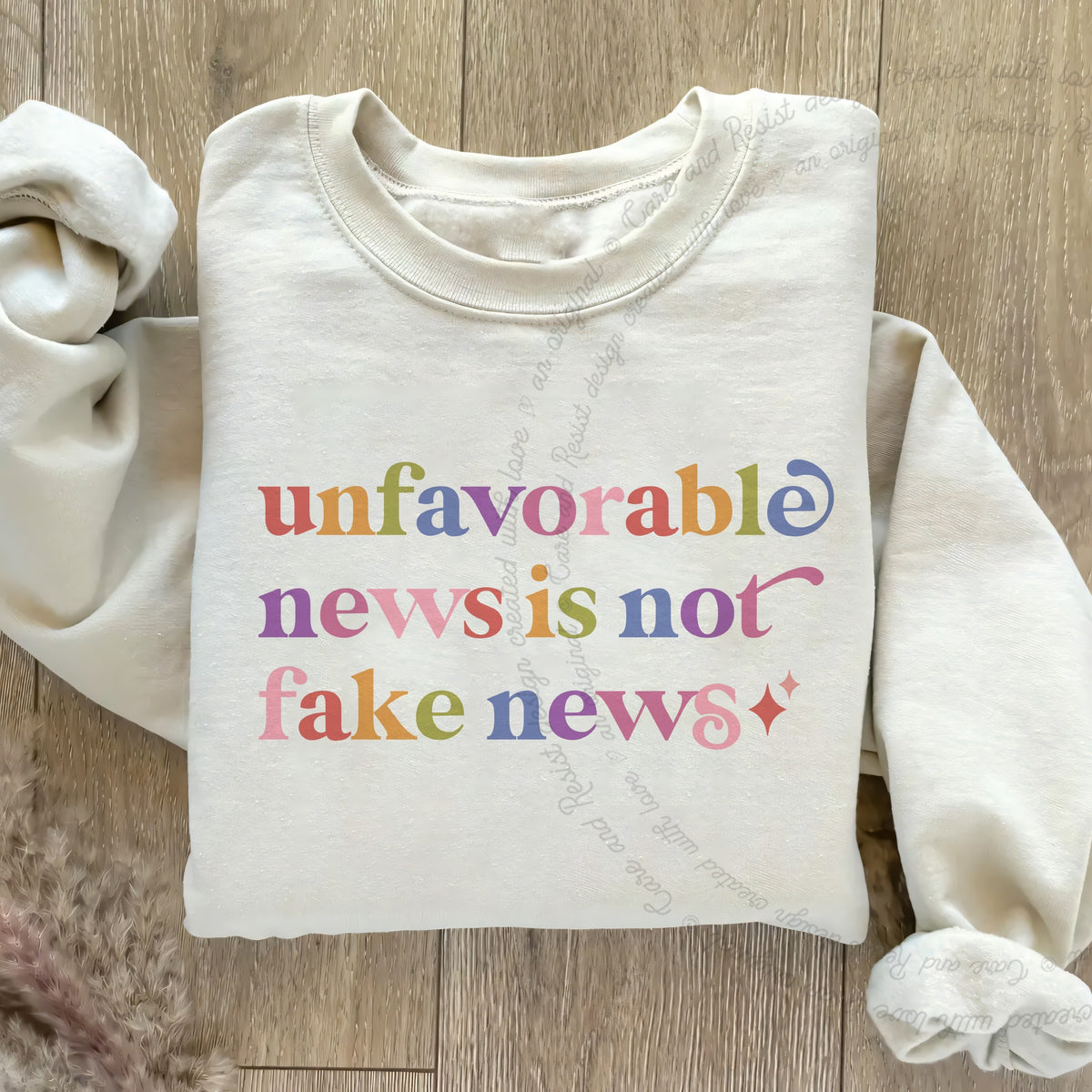 Unfavorable News is not Fake News Care & Resist Gildan crewneck sweatshirt in Sand