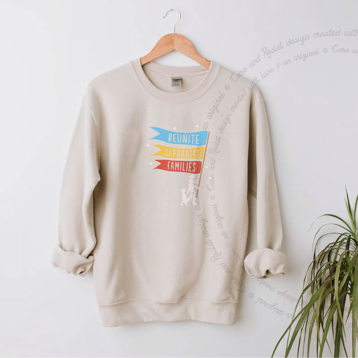 Reunite Separated Families Flags Care & Resist Gildan crewneck sweatshirt in Sand