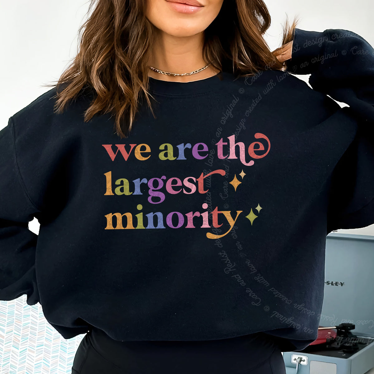 We are the Largest Minority Care & Resist Gildan crewneck sweatshirt in Black