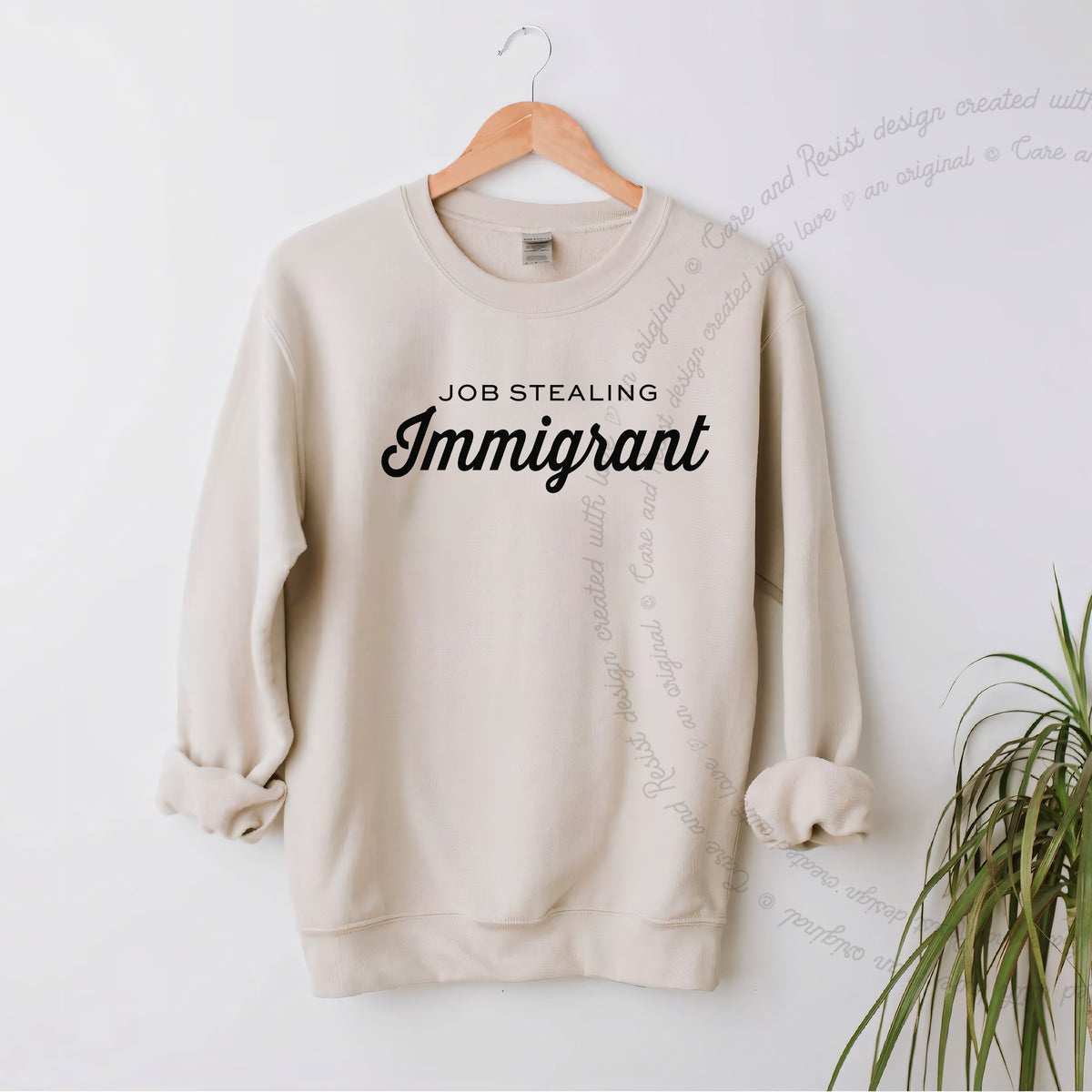 Job Stealing Immigrant Care & Resist Gildan crewneck sweatshirt in Sand