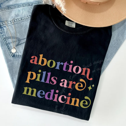 Abortion Pills are Medicine Care & Resist rainbow Comfort Colors tee, Black