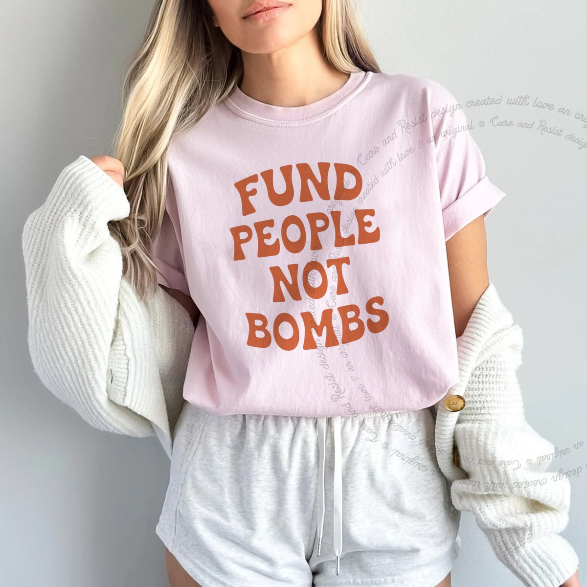 Fund People not Bombs Stacked Care & Resist progressive t-shirt in Blossom
