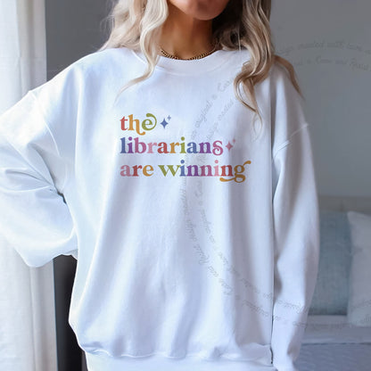 The Librarians are Winning Care & Resist Gildan crewneck sweatshirt in White