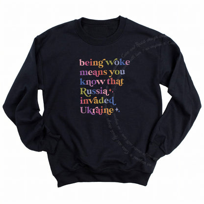 Being Woke Means You Know That Russia Invaded Ukraine Care & Resist Gildan crewneck sweatshirt in Black